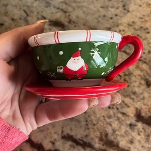 Vintage holiday coffee mug with Santa candle